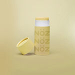 Load image into Gallery viewer, Opened light yellow nose sunscreen container in modern yellow biodegradable packaging
